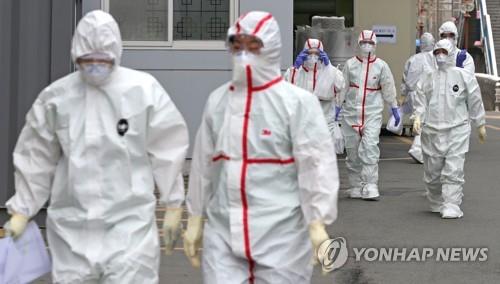(3rd LD) Medical staff under pressure amid spiking virus cases in S. Korea