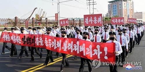 This photo, captured from the homepage of the Korean Central News Agency on June 9, 2020, shows one of the marches by North Korean youths and students across the nation in protest against anti-Pyongyang leaflets recently sent to the communist nation via balloons by North Korean defectors in South Korea. (For Use Only in the Republic of Korea. No Redistribution) (Yonhap)