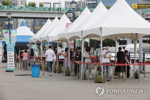 New infections under 1,500 on fewer tests; cases piling up outside of Seoul