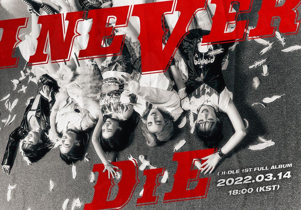 This photo provided by Cube Entertainment on March 14, 2022, shows a promotional poster for K-pop girl group (G)I-dle's first full-length album titled "I Never Die." (PHOTO NOT FOR SALE) (Yonhap)