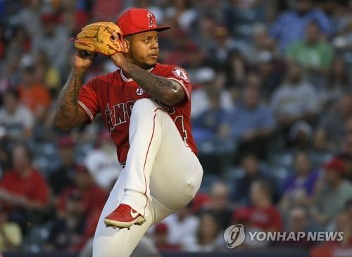 In this Getty Images file photo from July 17, 2019, Felix Pena of the Los Angeles Angels pitches against the Houston Astros during the top of the first inning of a Major League Baseball regular season game at Angel Stadium in Anaheim, California. (Yonhap)