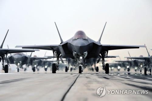 This file photo, provided by the defense ministry, shows the South Korean Air Force's F-35A stealth fighters performing an elephant walk at an unidentified air base on March 25, 2022. (PHOTO NOT FOR SALE) (Yonhap)