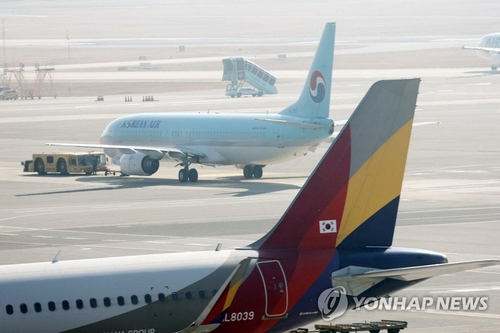 Britain likely to OK Korean Air-Asiana combination: sources