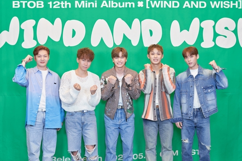K-pop boy group BTOB poses during a press conference held at a hotel in Seoul on May 2, 2023, for its 12th EP, "Wind and Wish," in this photo provided by Cube Entertainment. (PHOTO NOT FOR SALE) (Yonhap)
