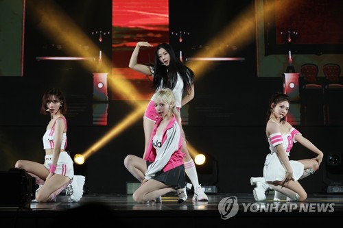K-pop girl group aespa performs during a press conference for its third EP, "My World," in Seoul on May 8, 2023. (Yonhap)