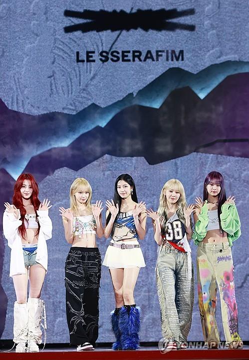 K-pop girl group Le Sserafim poses for photos during a media showcase for its new album, "Easy," in Seoul on Feb. 19, 2024. (Yonhap)