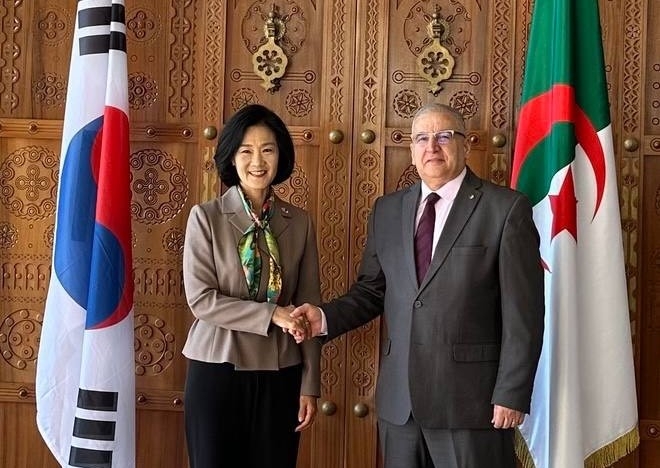 Kim Hyo-eun, ambassador and deputy foreign minister on climate change, shakes hands with Lounes Magramane, the secretary general of Algeria's Ministry of Foreign Affairs and National Community Abroad, during their meeting in Algeria on April 16, 2024, in this photo provided by Seoul's foreign ministry. (PHOTO NOT FOR SALE) (Yonhap)