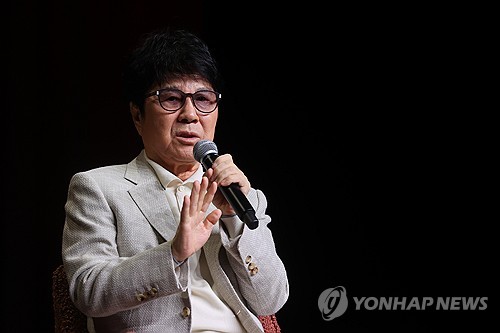 Singer Cho Yong-pil speaks during a press conference to promote his 20th full-length album, "20," in Seoul on Oct. 22, 2024. (Yonhap)