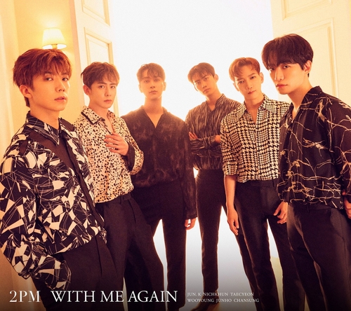 日本ミニアルバム「ＷＩＴＨ　ＭＥ　ＡＧＡＩＮ」のコンセプト写真（所属事務所提供）＝（聯合ニュース）≪転載・転用禁止≫