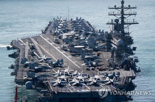 韓米合同演習に参加するため、９月２３日に韓国南部の釜山作戦基地に入港した米海軍の原子力空母「ロナルド・レーガン」＝（聯合ニュース）