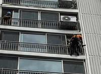 아파트 10층 난간 앉아있던 90대 구조…치매 의심 증상