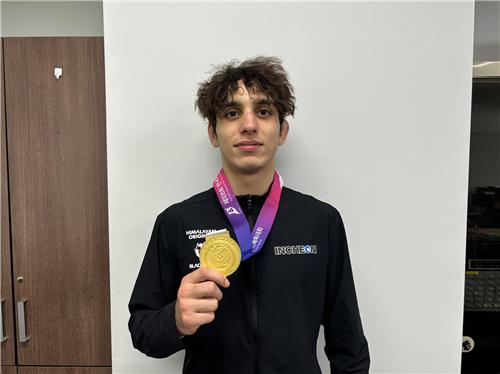 남자 대학부 그레코로만형 60㎏급 우승한 귀화 선수 푸다 모아이즈 아흐메드