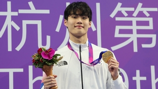 El nadador Hwang Sun-woo obtiene el oro en los 200 m estilo libre en los JJ. AA.