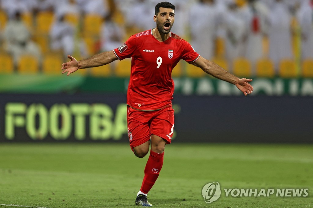 In this AFP photo, Mehdi Taremi of Iran celebrates his goal against the United Arab Emirates during the teams' Group A match in the final Asian qualifying round for the 2022 FIFA World Cup at Zabeel Stadium in Dubai on Oct. 7, 2021. (Yonhap)