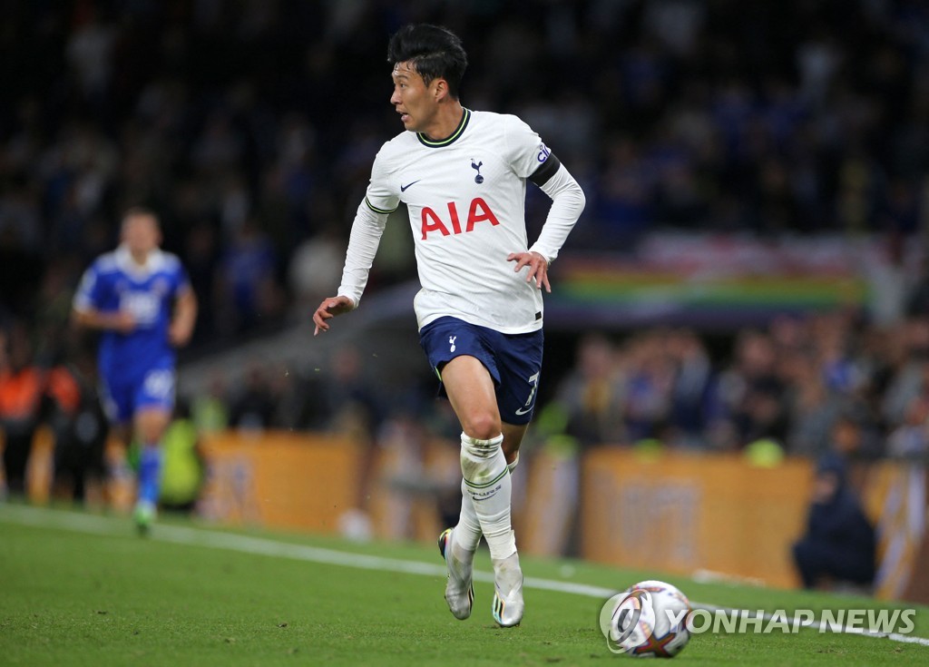 In this AFP photo, Son Heung-min of Tottenham Hotspur runs with the ball against Leicester City during the clubs' Premier League match at Tottenham Hotspur Stadium in London on Sept. 17, 2022. (Yonhap)