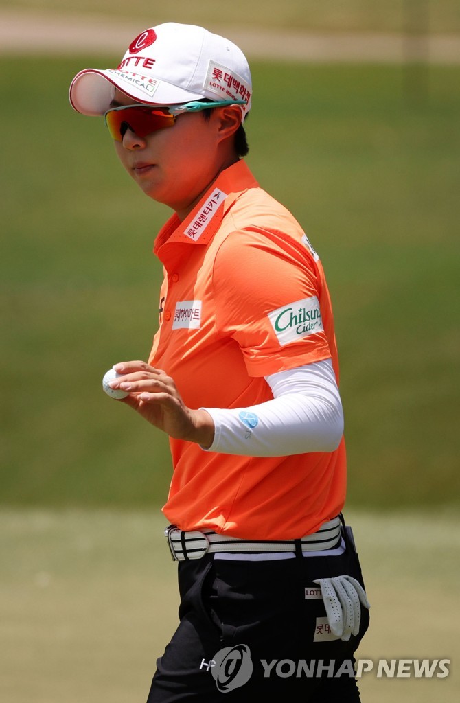 In this Getty Images photo, Kim Hyo-joo of South Korea reacts to her par putt on the first green during the final round of the KPMG Women's PGA Championship at Atlanta Athletic Club in Johns Creek, Georgia, on June 27, 2021. (Yonhap)