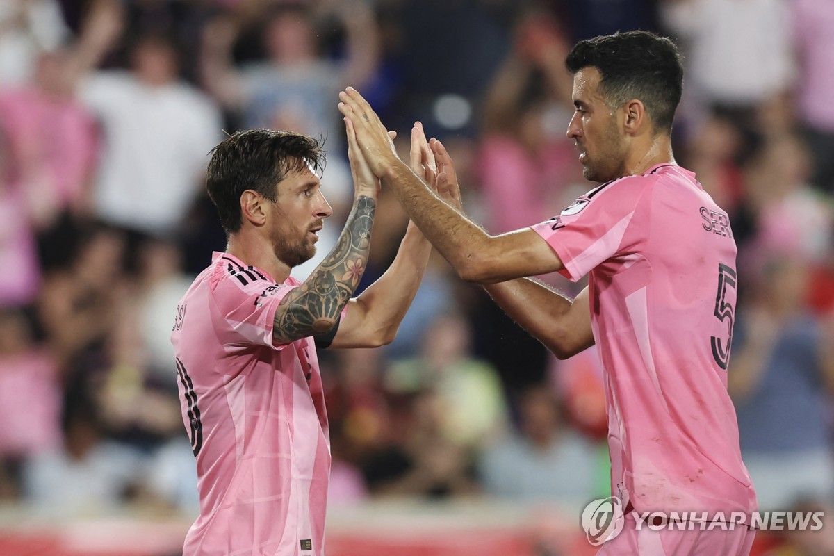 리오넬 메시와 세르히오 부스케츠