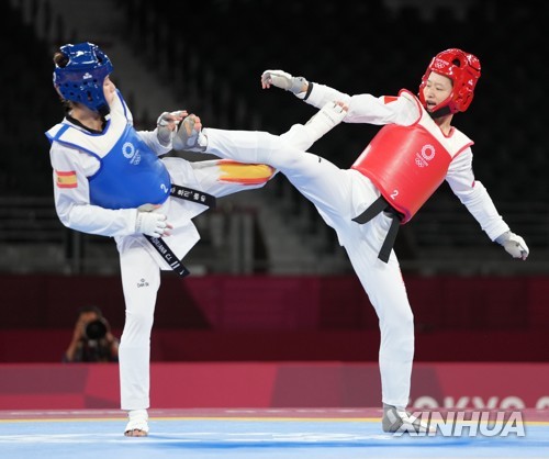 [올림픽] 4회 연속 출전 '태권 여제' 우징위, 10대 소녀에게 혼쭐