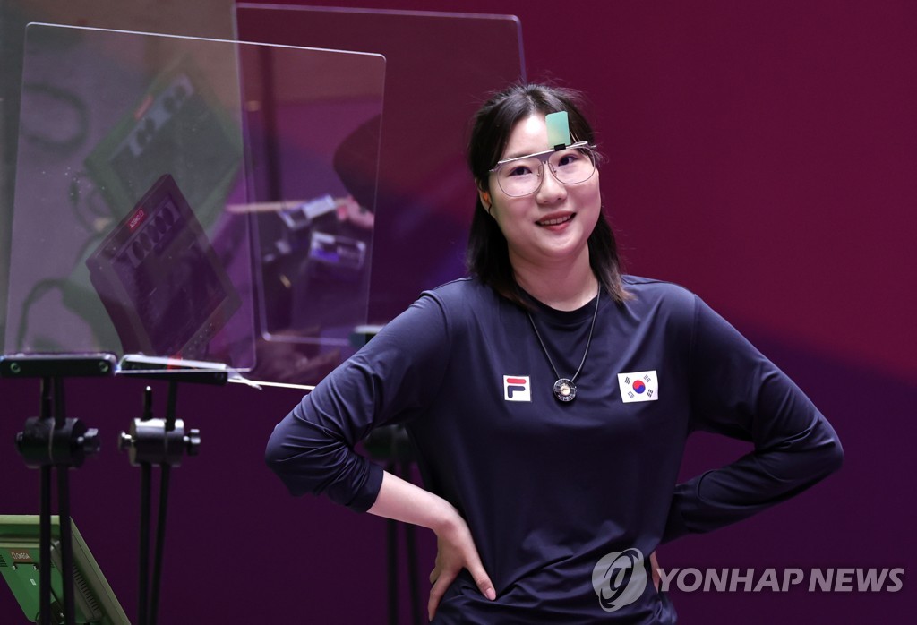 In this Reuters photo, Kim Min-jung of South Korea reacts to her shoot-off loss to Vitalina Batsarashkina of the Russian Olympic Committee in the women's 25m pistol final at the Tokyo Olympics at Asaka Shooting Range in Tokyo on July 30, 2021. (Yonhap)