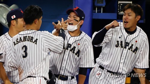 Olympics-Baseball-South Koreans strike in extra inning for