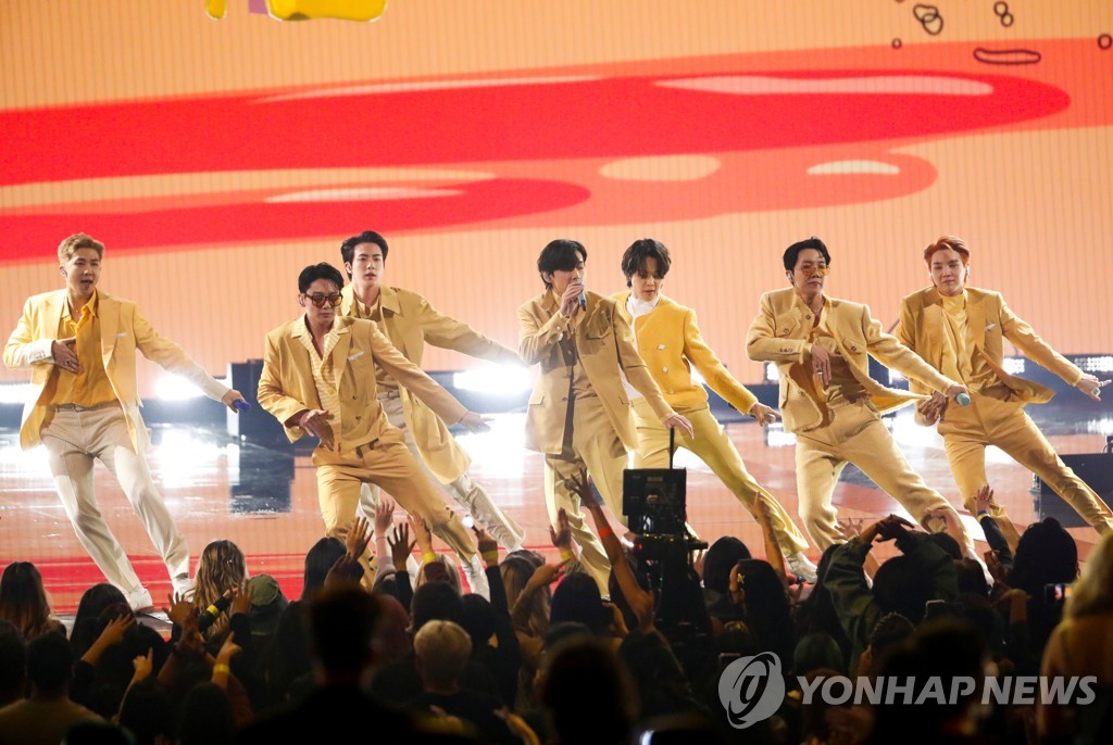 This Reuters photo shows BTS performing "Butter" during the 2021 American Music Awards on Nov. 21, 2021, at Microsoft Theater in Los Angeles. (Yonhap)