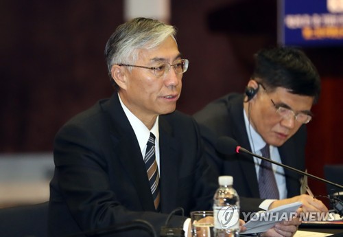 This file photo, taken Dec. 5, 2019, shows former Chinese Ambassador to South Korea Qiu Guohong speaking at a meeting of businessmen and former government officials in Seoul. (Yonhap)