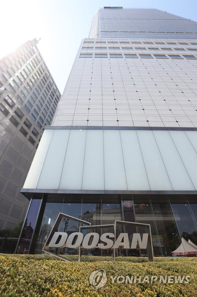 This file photo from April 8, 2020, shows Doosan Group's logo in front of Doosan Tower in Seoul. (Yonhap)