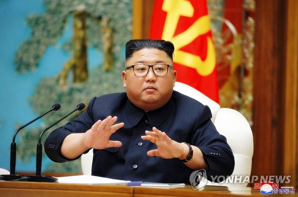 North Korean leader Kim Jong-un speaks at a politburo meeting held on April 11, 2020, in this photo captured from the website of the Korean Central News Agency (For Use Only in the Republic of Korea. No Redistribution) (Yonhap) 
