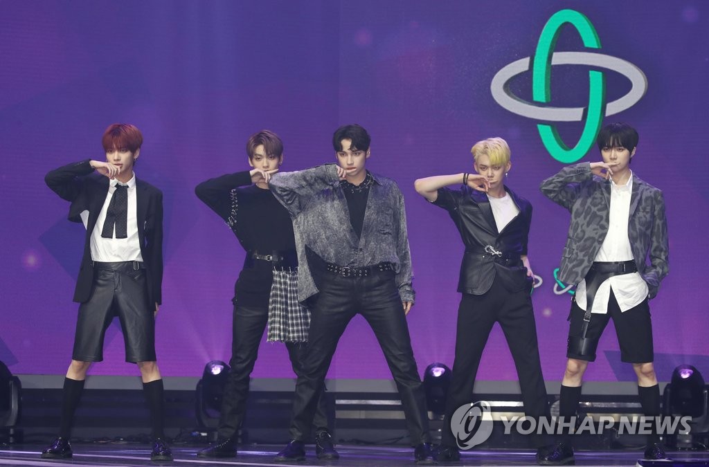 In this file photo, South Korean boy band Tomorrow X Together performs on stage during a showcase for its new EP album, "The Dream Chapter: Eternity," at an arts hall in Seoul on May 18, 2020. (Yonhap)