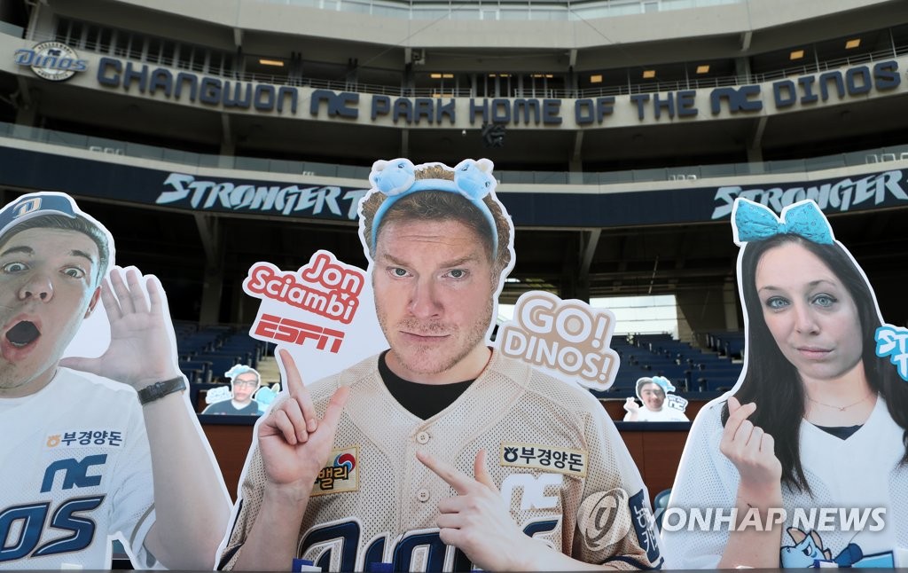 This file photo from May 24, 2020, shows the cardboard cutout of ESPN's baseball play-by-play man, Jon Sciambi (C), placed in the stands at Changwon NC Park, home of the Korea Baseball Organization club NC Dinos, in Changwon, 400 kilometers southeast of Seoul. (Yonhap)