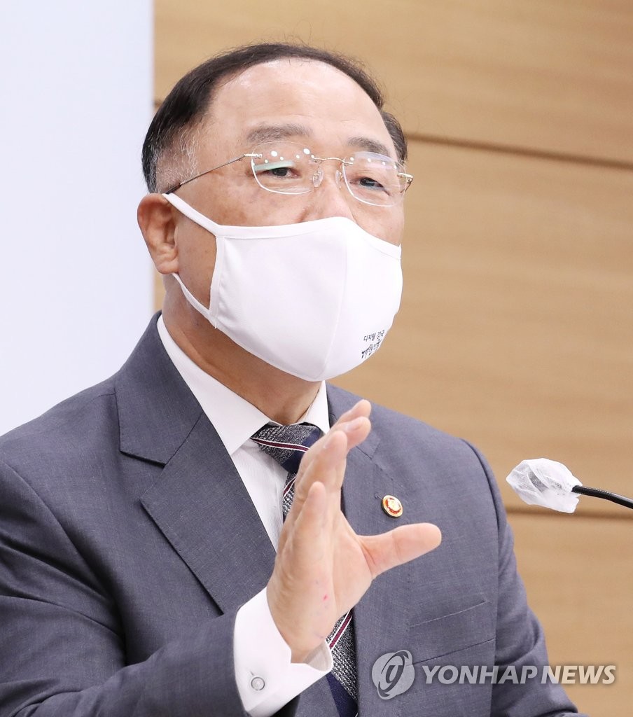 In this file photo, Finance Minister Hong Nam-ki speaks during a press conference at the government complex in Sejong, central South Korea, on Aug. 27, 2020, to unveil the government's proposal for a record 555.8 trillion-won budget for 2021. (Yonhap)