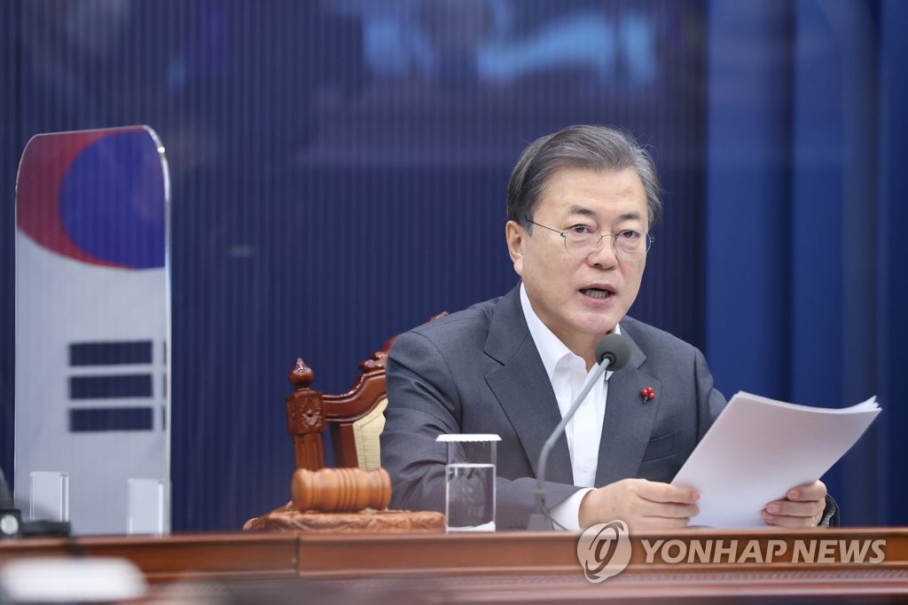 President Moon Jae-in speaks via videoconference during a Cabinet meeting at the presidential office Cheong Wa Dae in Seoul on Dec. 15, 2020. (Yonhap)