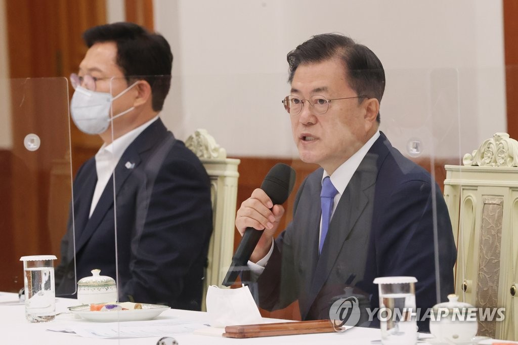President Moon Jae-in speaks during a meeting with leaders of the ruling Democratic Party at Cheong Wa Dae in Seoul on May 14, 2021. (Yonhap)