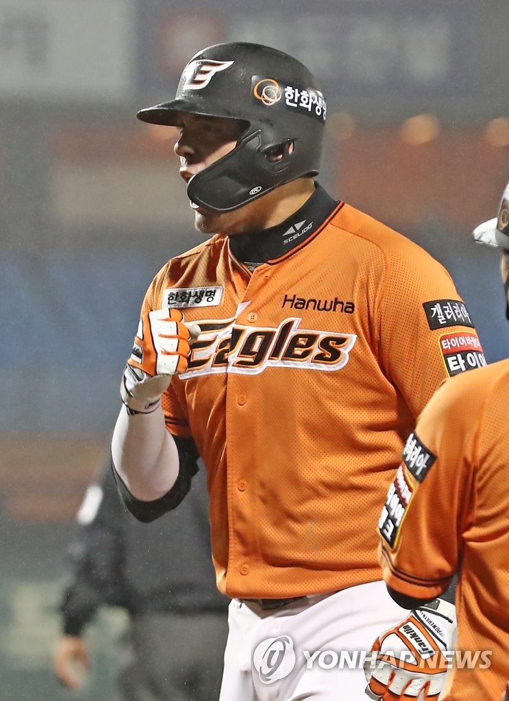 In this file photo from May 21, 2021, Ryon Healy of the Hanwha Eagles celebrates his RBI single against the KT Wiz in the bottom of the fourth inning of a Korea Baseball Organization regular season game at Hanwha Life Eagles Park in Daejeon, 160 kilometers south of Seoul. (Yonhap)