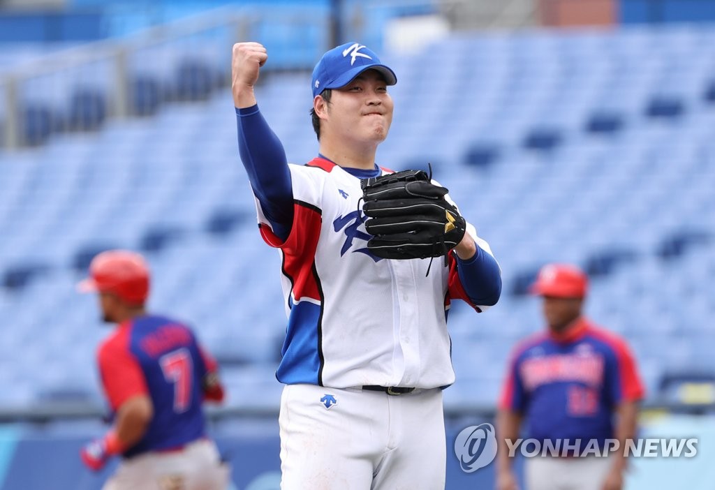 In this file photo from Aug. 7, 2021, South Korean reliever Cho Sang-woo celebrates after completing a scoreless top of the seventh inning against the Dominican Republic during the bronze medal game at the Tokyo Olympic baseball tournament at Yokohama Stadium in Yokohama, Japan. (Yonhap)