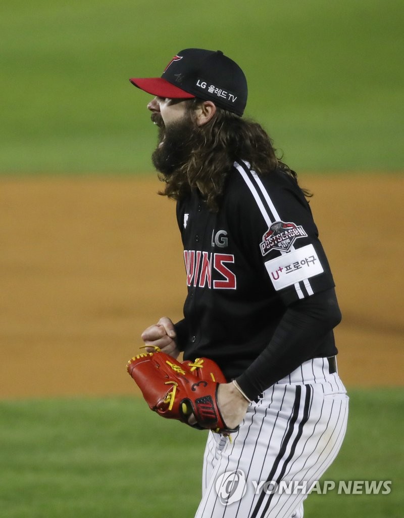 In this file photo from Nov. 5, 2021, LG Twins' starter Casey Kelly celebrates after striking out Jose Miguel Fernandez of the Doosan Bears to end the bottom of the fifth inning in Game 2 of the first round in the Korea Baseball Organization postseason at Jamsil Baseball Stadium in Seoul. (Yonhap)