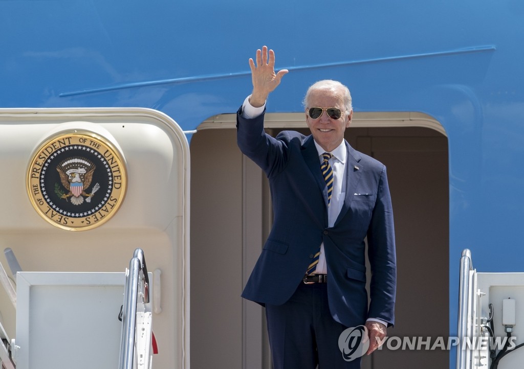 This photo, provided by the AP, shows U.S. President Joe Biden boarding Air Force One at Joint Base Andrews in Maryland on May 19, 2022, as he heads to South Korea. (Yonhap)