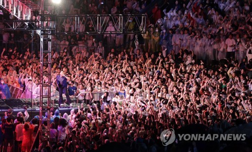 Psy performs at school festival
