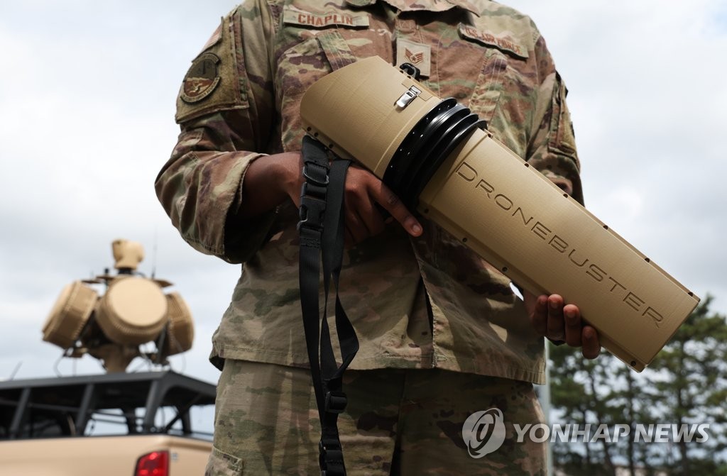 A soldier holds a dronebuster at Kunsan Air Base in Gunsan, 275 kilometers south of Seoul, on July 7, 2022. (Yonhap)
