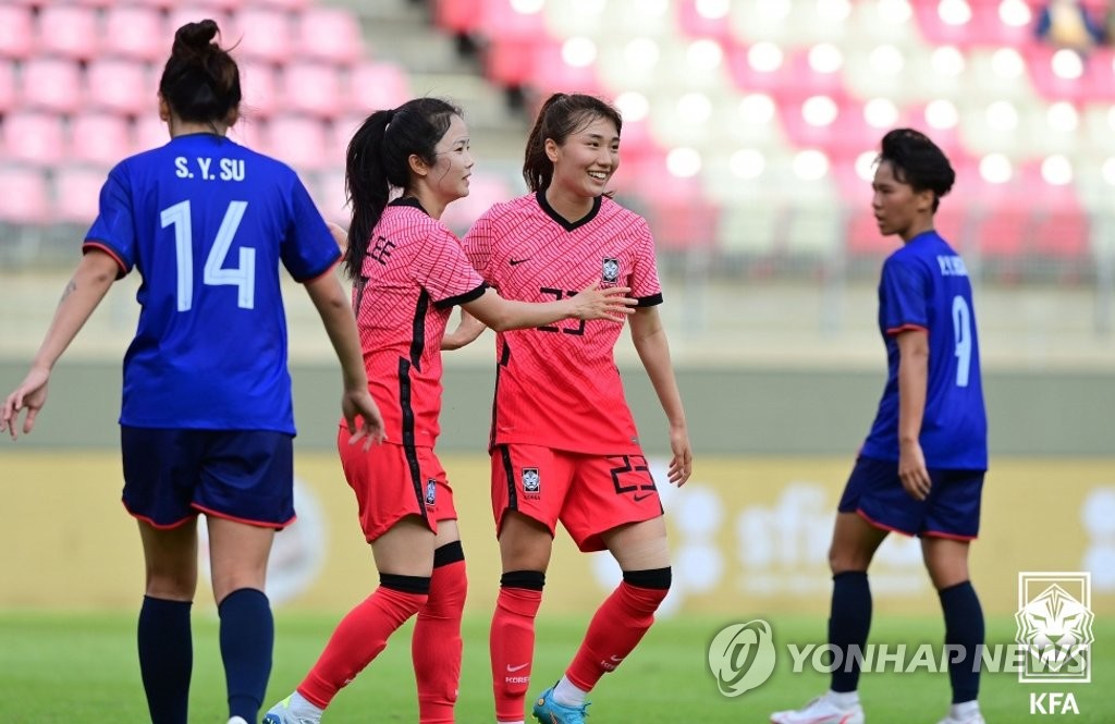 Lee Min-a of South Korea (2nd from L) celebrates her goal during the team's match against Taiwan at the East Asian Football Federation E-1 Women's Football Championship at Kashima Soccer Stadium in Kashima, Japan, on July 26, 2022, in this photo provided by the Korea Football Association. (PHOTO NOT FOR SALE) (Yonhap)