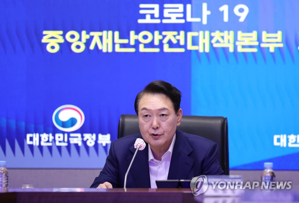 President Yoon Suk-yeol speaks during a meeting of the Central Disaster and Safety Countermeasures Headquarters about measures to deal with the coronavirus pandemic at the government complex in Seoul on July 29, 2022. (Yonhap)