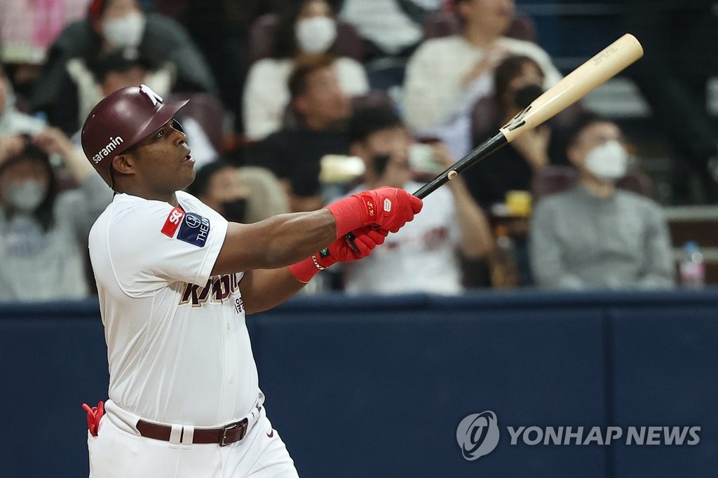 Yasiel Puig of the Kiwoom Heroes hits a solo home run against the LG Twins during the bottom of the third inning of Game 4 of the second round in the Korea Baseball Organization postseason at Gocheok Sky Dome in Seoul on Oct. 28, 2022. (Yonhap)