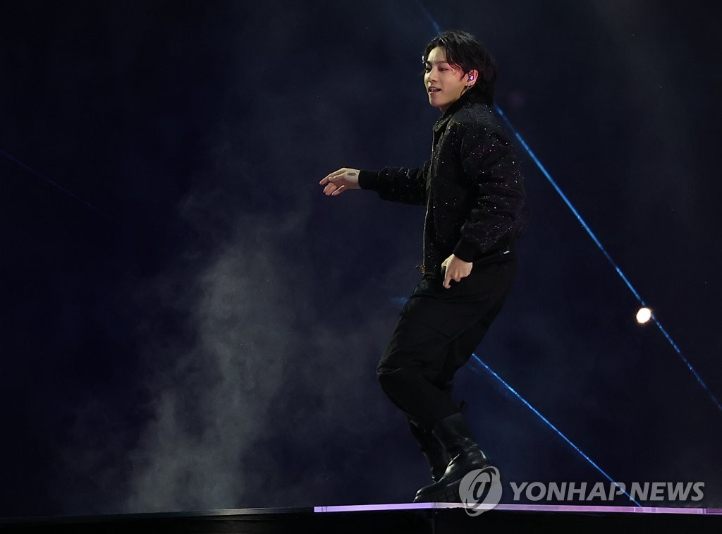 BTS member Jungkook performs during the opening ceremony for the 2022 FIFA World Cup at Al Bayt Stadium in Al Khor, north of Doha, on Nov. 20, 2022. (Yonhap)