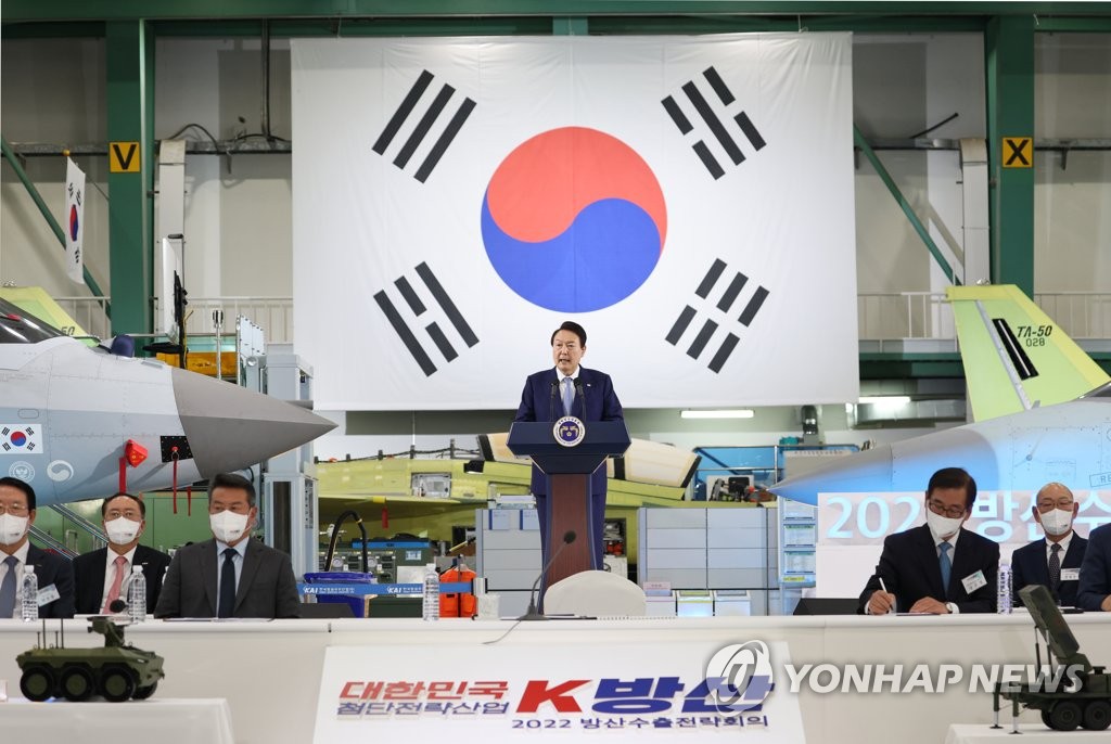 President Yoon Suk-yeol speaks during a meeting of government and military officials and heads of local defense firms to expand arms exports at Korea Aerospace Industries, South Korea's sole aircraft maker, in Sacheon, 301 kilometers south of Seoul, on Nov. 24, 2022. (Yonhap)