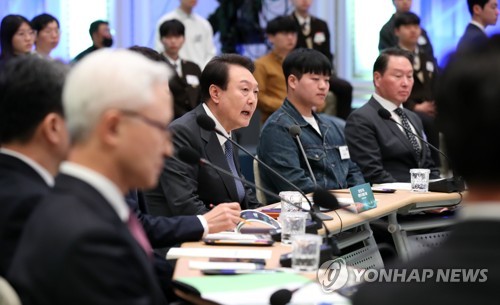 President Yoon Suk Yeol (C) speaks during the 14th emergency economic and public livelihood meeting at the former presidential compound of Cheong Wa Dae in Seoul on March 15, 2023. (Pool photo) (Yonhap)