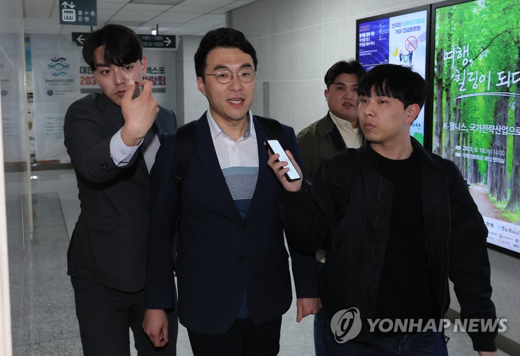 Rep. Kim Nam-kuk of the main opposition Democratic Party is seen answering questions from reporters at the National Assembly in Seoul on May 10, 2023. (Yonhap)