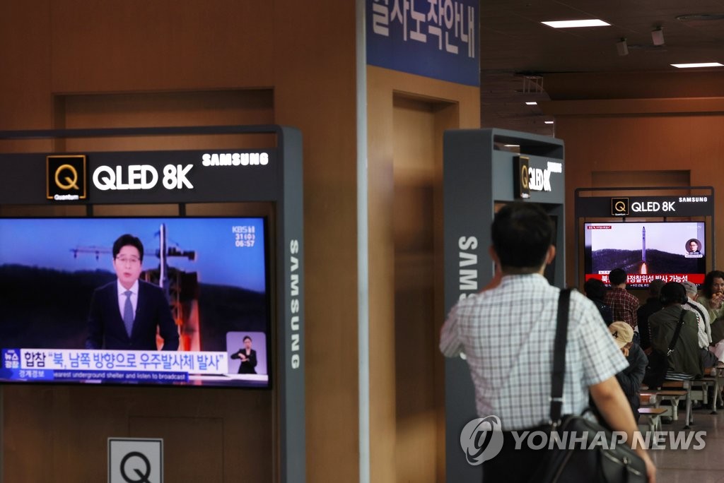 TV footage is aired of North Korea's launch of a military spy satellite on May 31, 2023. (Yonhap)