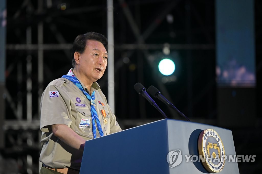 President Yoon Suk Yeol delivers a welcoming speech during the opening ceremony of the 25th World Scout Jamboree in Saemangeum, about 180 km southwest of Seoul, on the night of Aug. 2, 2023, in this photo provided by the presidential office. (PHOTO NOT FOR SALE) (Yonhap)