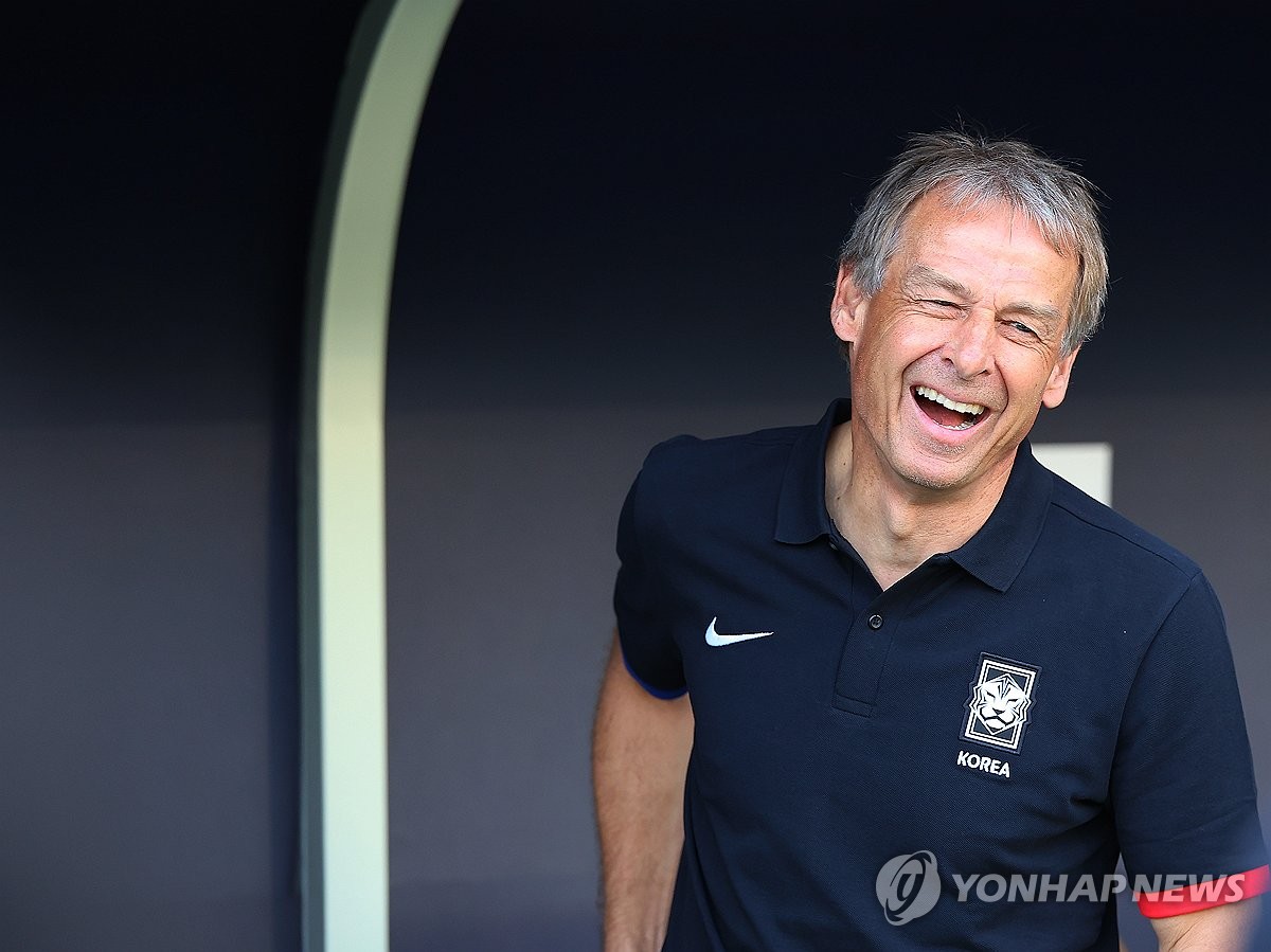 South Korea coach Jurgen Klinsmann smiles during the match between Group E and Bahrain in the Asian Football Confederation Asian Cup held at Jassim Bin Hamad Stadium in Doha on January 15, 2024 (Yonhap News)