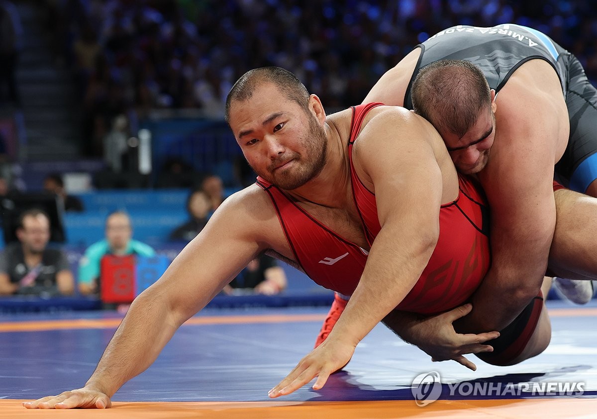 (2nd LD) (Olympics) GrecoRoman wrestler misses out on chance for